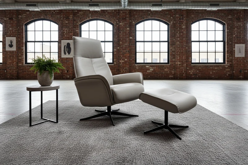KAWOLA Relaxsessel JOSIANE Drehsessel Leder grau mit Hocker