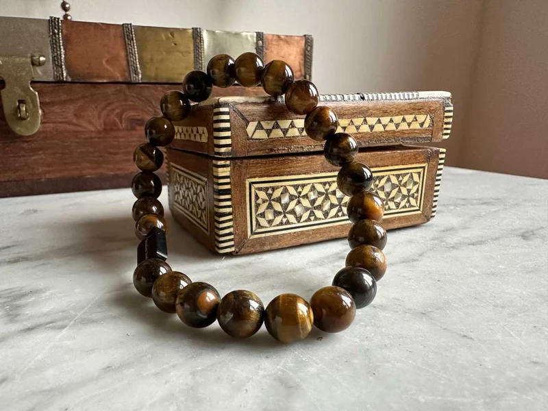 Design Unisex Perlenarmband 20-21cm Oslo Tigerauge Braun Naturstein dehnbar elastisch