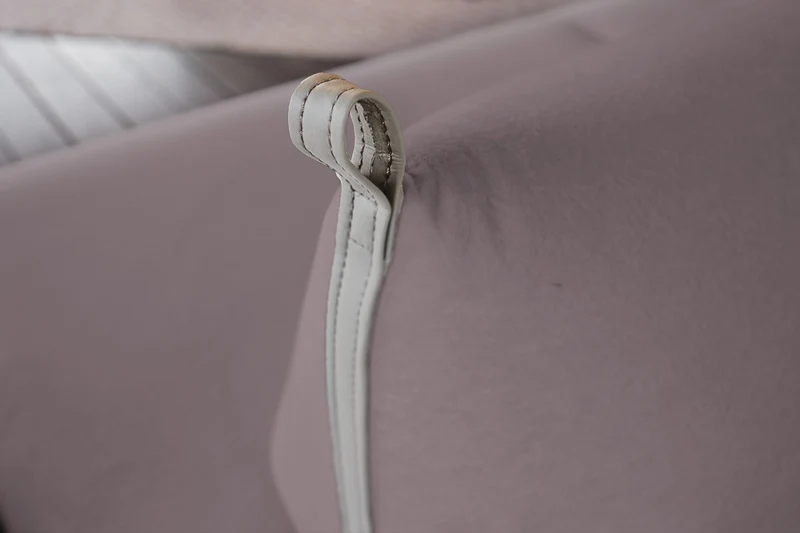 KAWOLA Sofa CANE Schlafsofa Daybed Stoff lila