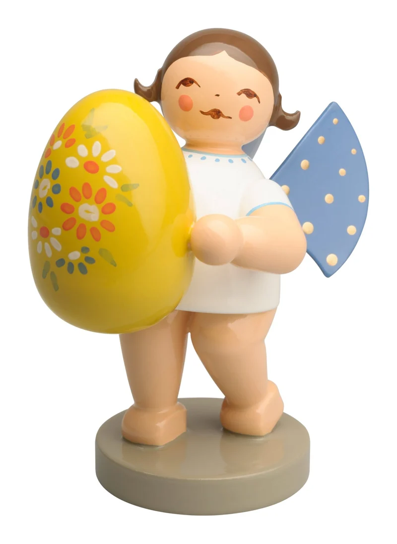 Wendt & Kühn 'Engel mit gelbem Osterei, stehend - 6cm braun' 2025