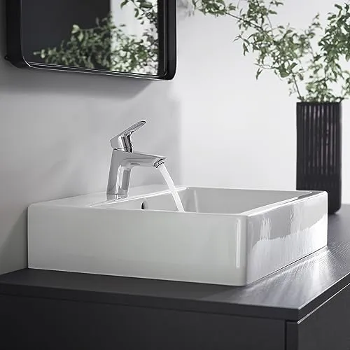 hansgrohe Logis - Waschtischarmatur mit Push-Open Ablauf, Wasserhahn Bad mit Auslauf Höhe 67 mm, Mischbatterie Waschbecken wassersparend (EcoSmart), Chrom, 71077000