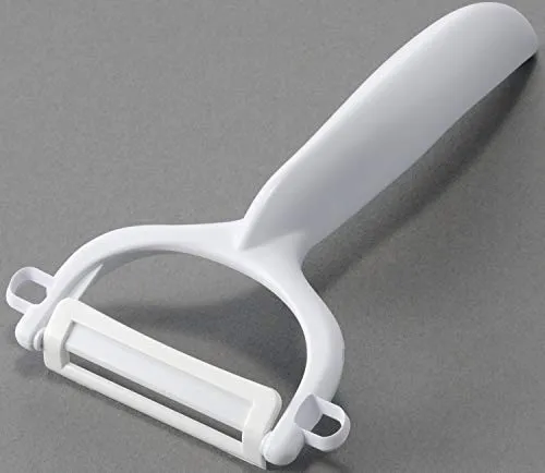 Kyocera Sparschäler Weiß | zweischneidige Klinge: 4 cm | extra scharfer Schäler | sauberes Schälen von Gemüse und Obst | spülmaschinenfester Obstschäler | Mehrzweck Gemüseschneider